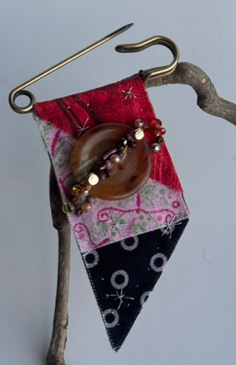 OOAK Saturn Textile Brooch - Vintage brown button, new & vintage beads - red, pink, brown, black